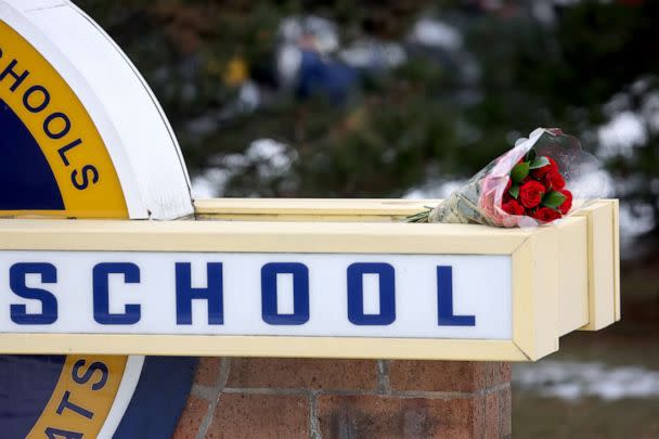 PHOTO: Flowers are placed on a sign outside Oxford High School a day after a deadly shooting at the school on Dec. 1, 2021 in Oxford, Mich. (Scott Olson/Getty Images)