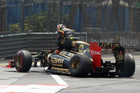 Lotus F1 Team's French driver Romain Grosjean gets out of his car after crashing at the Circuit de Monaco on May 27, 2012 in Monte Carlo during the Monaco Formula One Grand Prix. (TOM GANDOLFINITom Gandolfini/AFP/GettyImages)