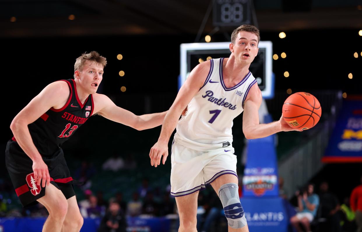 Northern Iowa forward Cole Henry (1) passes the ball past Stanford guard Michael Jones (13) during the Battle 4 Atlantis last November.