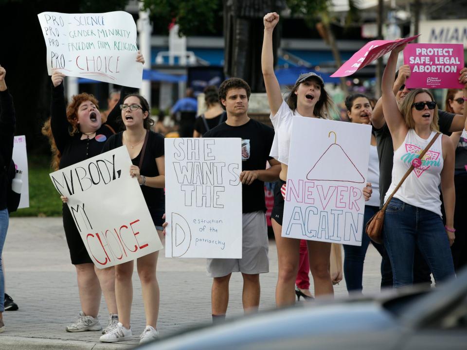 Demonstrators chant slogans during a rally in support of abortion rights in Miami, Florida.