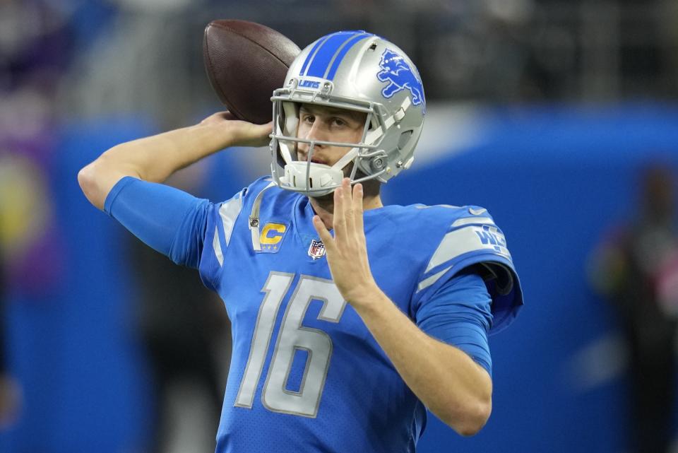 Detroit Lions' Jared Goff warms up before an NFL football game against the Minnesota Vikings Sunday, Dec. 11, 2022, in Detroit. (AP Photo/Paul Sancya)