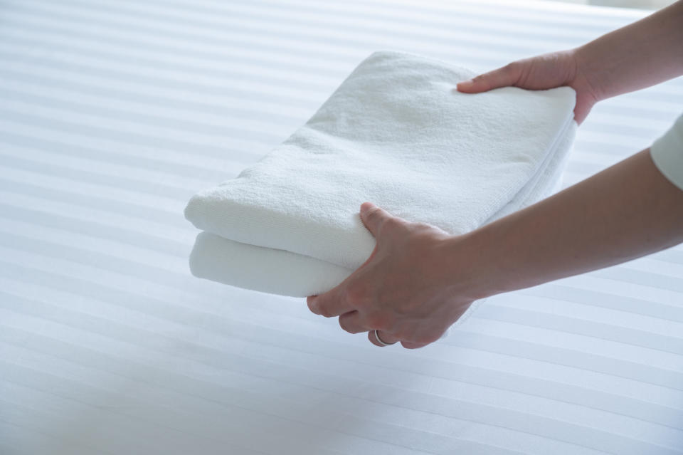 towel on top of bed