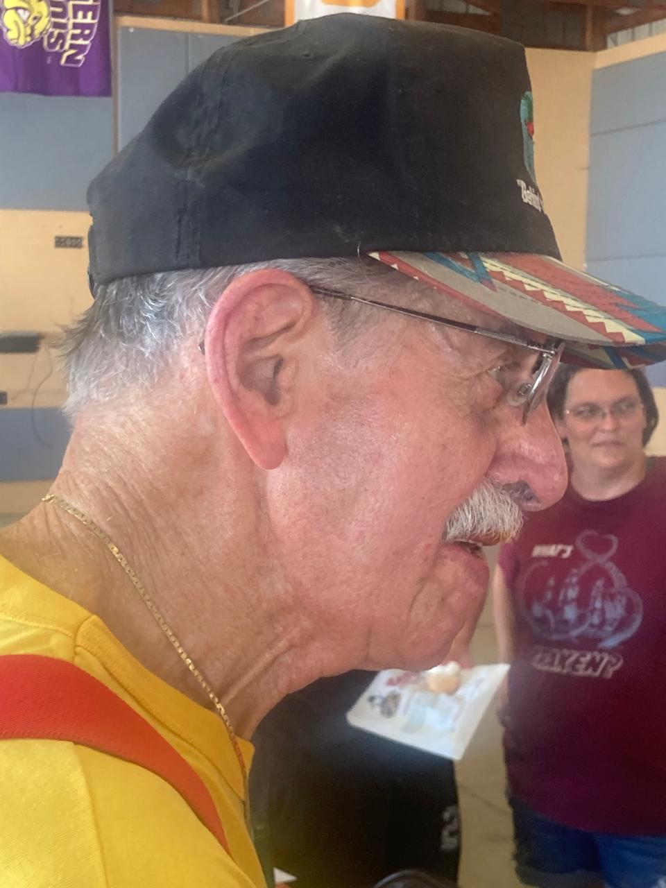 Les Eastep of Springfield talks to a guest at the Illinois State Fair Chili Cookoff at The Shed Sunday. Eastep, 86, said earlier that he is giving up competitive cooking but his win Sunday guarantees him a spot in the World Championship Chili Cook-off in Myrtle Beach, South Carolina, in 2024.