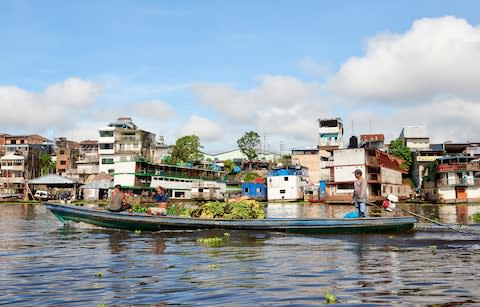 A boat transporting bananas on the Nanay river - Credit: Getty