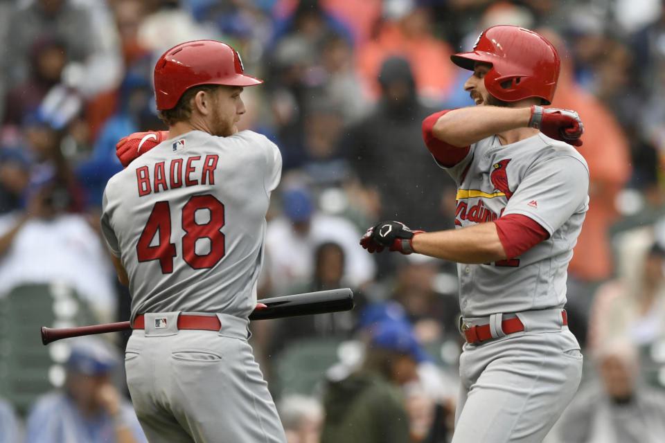 St. Louis Cardinals' Paul DeJong right, celebrates with teammate Harrison Bader (48) after hitting a solo home run during the third inning of a baseball game against the Chicago Cubs, Sunday, Sept. 22, 2019, in Chicago. (AP Photo/Paul Beaty)