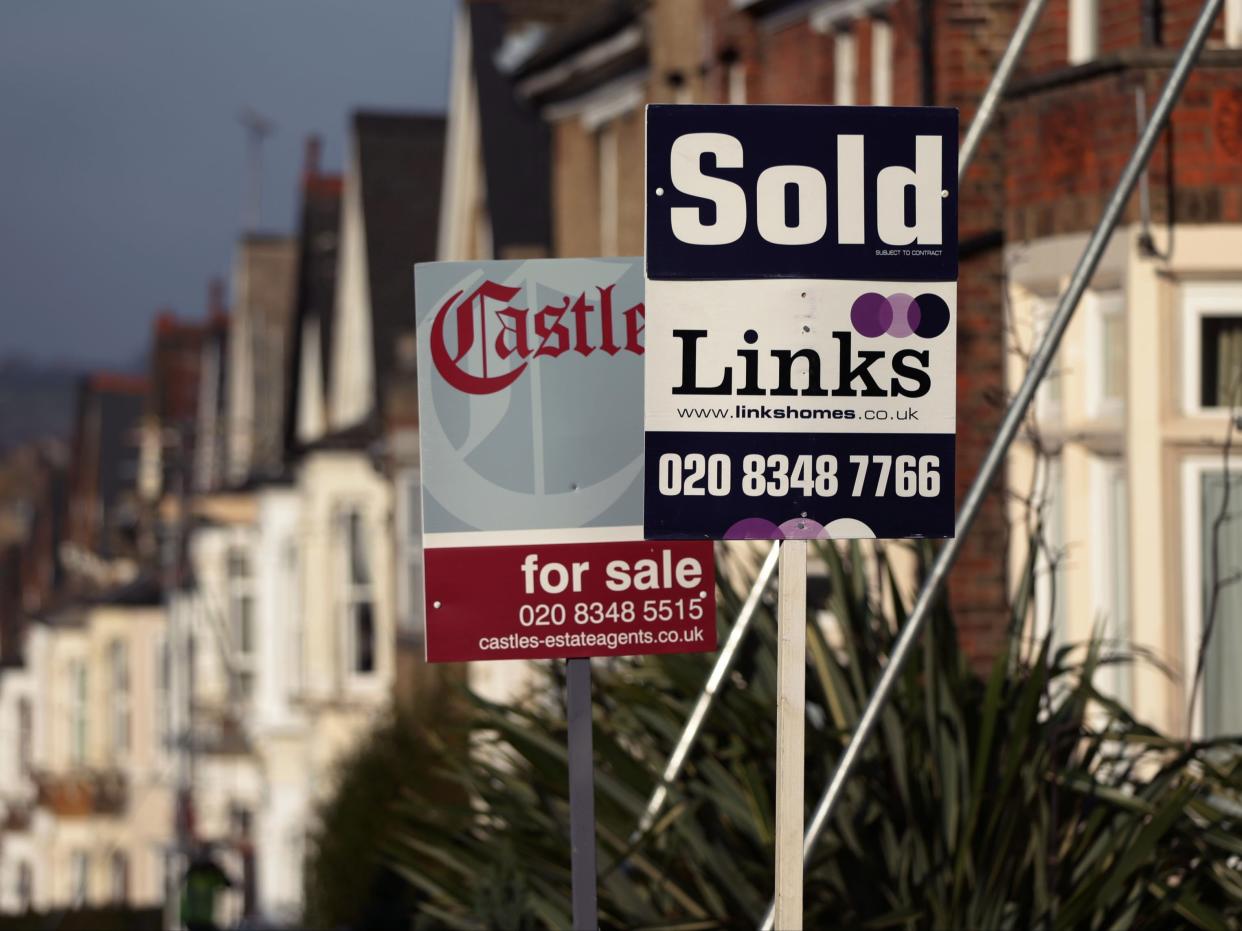 For Sale and Sold signs outside houses in north London (Yui Mok/PA)