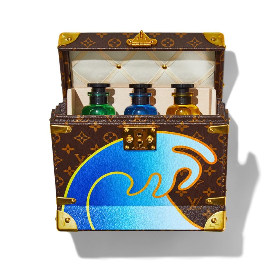 Travel case, $7,650, and colognes, $250 each, by Louis Vuitton