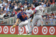 Cleveland Guardians' Amed Rosario (1) beats Minnesota Twins starting pitcher Sonny Gray (54) to first base on a hit in the fifth inning of a baseball game Wednesday, June 22, 2022, in Minneapolis. (AP Photo/Andy Clayton-King)