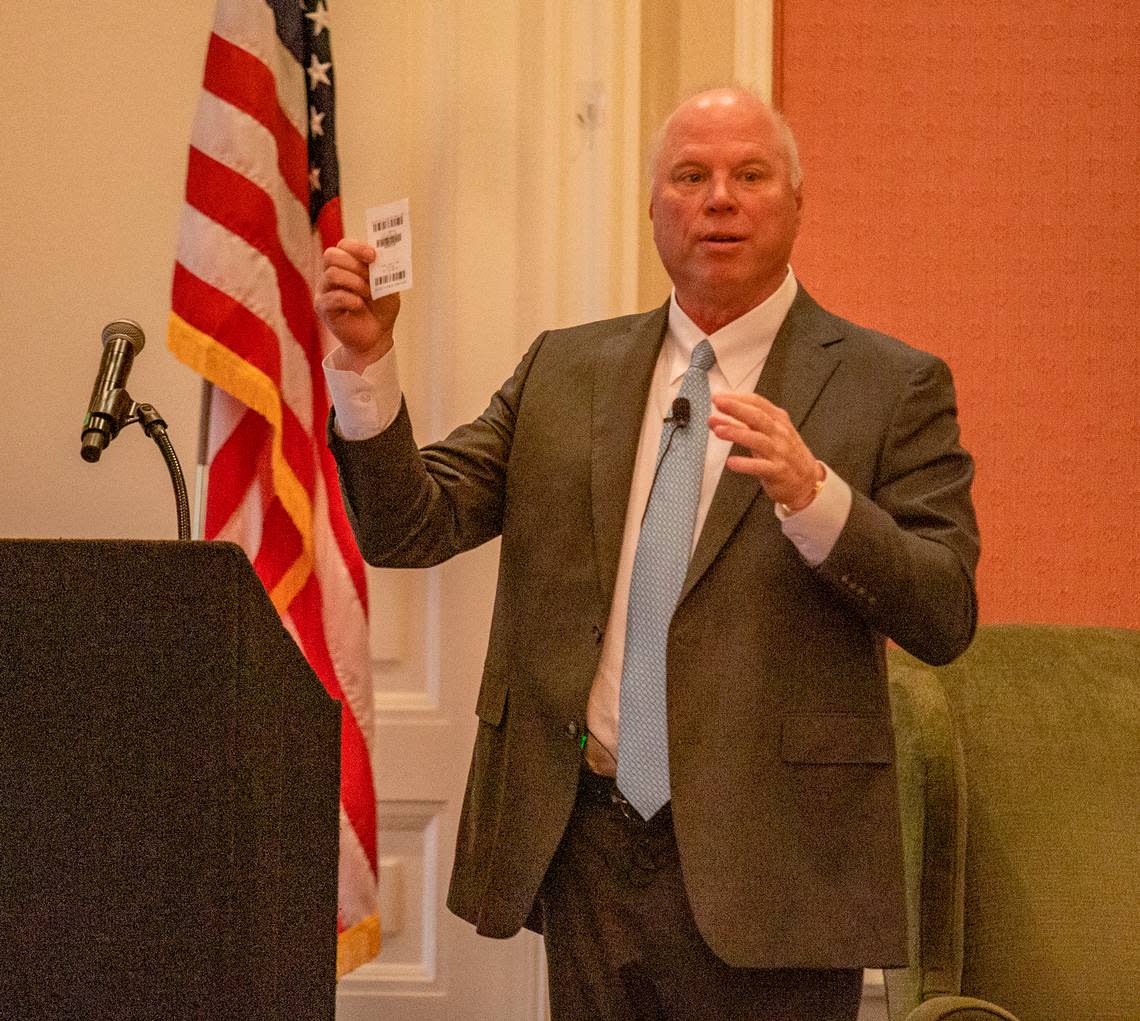 Exchange Club President and “Chief Extractor” George Young Jr. at the annual Goodfellows Luncheon fundraiser at the Fort Worth Club Wednesday, Dec. 7, 2022. Republican political consultant Karl Rove spoke at the event.