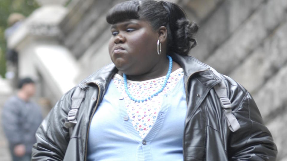 Gabourney Sidibe walks on the street in Precious