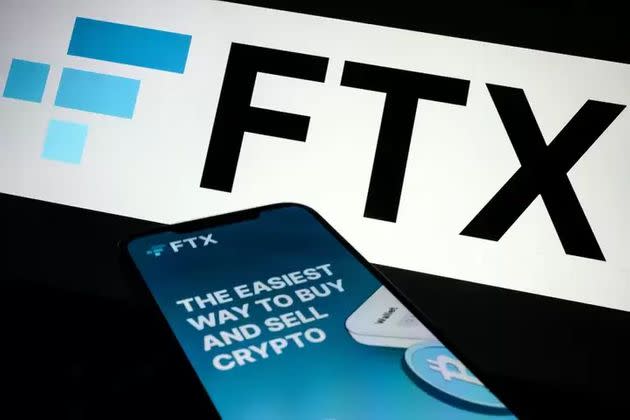 In this photo illustration, the FTX logo and mobile app are displayed on screens on Nov. 10 in London, England.