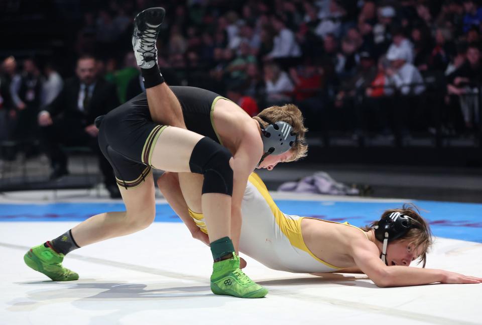 Caleb Jackson, Maple Mountain, beats Kaleb Blackner, Roy, at 113 pounds in the 5A boys wrestling state championships at UVU in Orem on Saturday, Feb. 17, 2024. | Jeffrey D. Allred, Deseret News