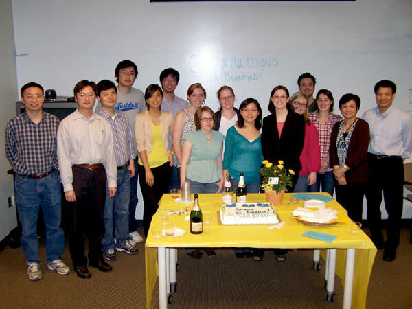 Professor Xiao-Jiang Li (right) and Shihua Li (second from the right) Credit: Emory University