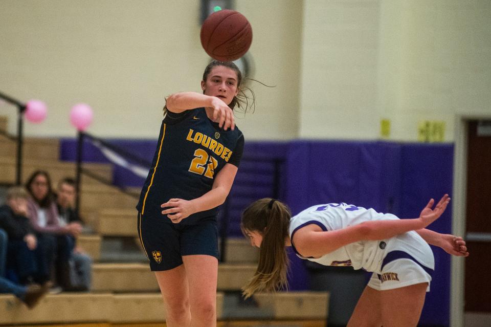 Lourdes' Simone Pelish passes the ball during the Section 9 BCANY Coaches vs Cancer tournament at Monroe-Woodbury High School in Central Valley, NY on January 7, 2023.