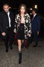 <p>In a cattle print fringed jacket, plaid flannel, black belted minidress, grey socks and heeled combat boots while attending the DSquared2 Volt Party in Milan.</p>