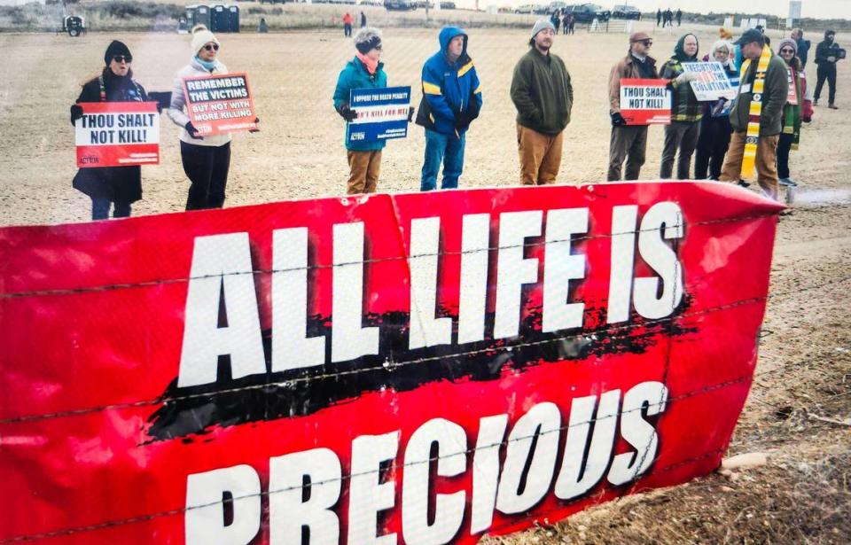 Death penalty protesters gather outside the Idaho Department of Correction prison complex south of Boise, where longtime death row prisoner Thomas Creech, 73, was scheduled to be executed Wednesday morning.