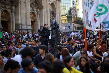 Demonstrators gather as they participate in the March for Science rally on Earth Day, in Santiago, April 22, 2017. REUTERS/Ivan Alvarado