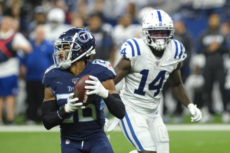 Tennessee Titans cornerback Logan Ryan (26) intercepts a pass intended for Indianapolis Colts wide receiver Zach Pascal (14) during the second half of an NFL football game in Indianapolis, Sunday, Dec. 1, 2019. (AP Photo/AJ Mast)