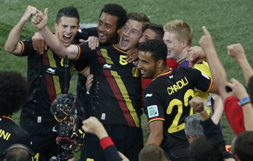 Belgium's Jan Vertonghen celebrates his goal with team mates during their 2014 World Cup Group H soccer match against South Korea at the Corinthians arena in Sao Paulo