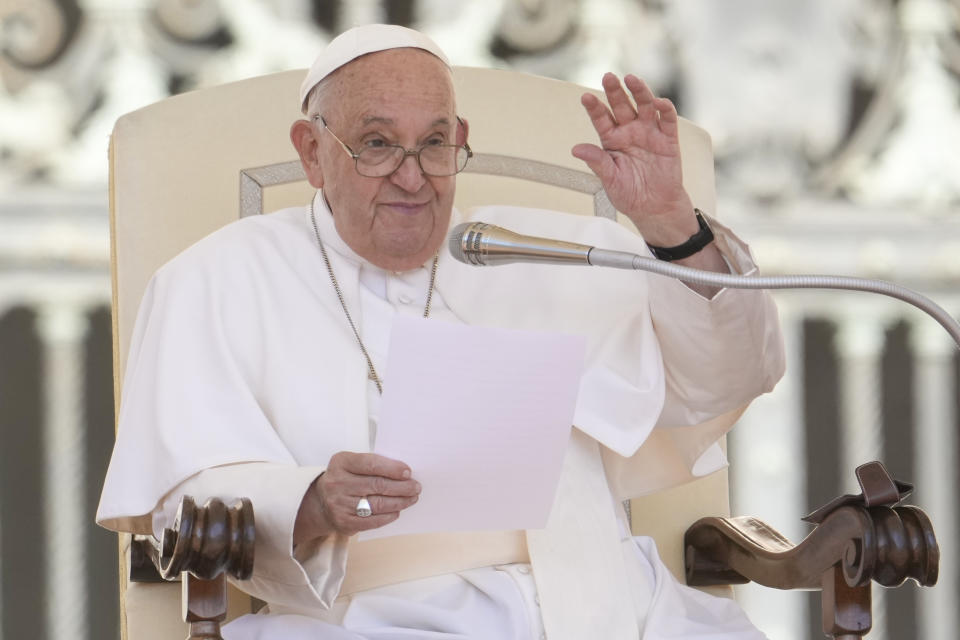 Pope Francis waves during his weekly general audience in the St. Peter's Square at the Vatican, Wednesday, June 26, 2024. (AP Photo/Andrew Medichini)