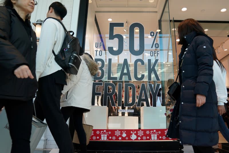 FILE PHOTO: People shop in King of Prussia Pennsylvania on Black Friday