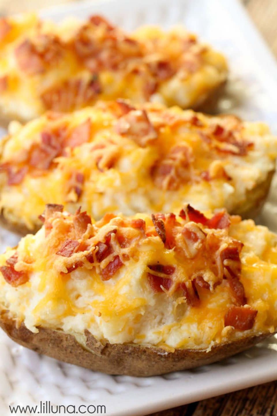 <p>You can't go wrong with classic fillings like sour cream, bacon, and cheese.</p><p><strong>Get the recipe at </strong><strong><a href="https://lilluna.com/twice-baked-potatoes/" rel="nofollow noopener" target="_blank" data-ylk="slk:Lil' Luna;elm:context_link;itc:0;sec:content-canvas" class="link ">Lil' Luna</a>. </strong></p><p><strong>Tools you'll need: </strong>Dr. Teo Stainless Steel Potato Masher ($8, <a href="https://www.amazon.com/dp/B071DGS54D/?tag=syn-yahoo-20&ascsubtag=%5Bartid%7C10070.g.3167%5Bsrc%7Cyahoo-us" rel="nofollow noopener" target="_blank" data-ylk="slk:amazon.com;elm:context_link;itc:0;sec:content-canvas" class="link ">amazon.com</a>)<br></p>