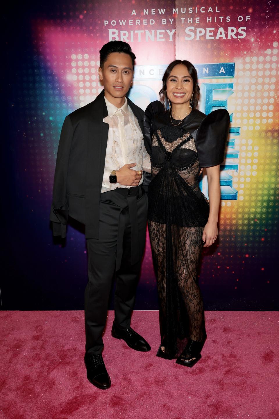 Keone Madrid, left, and Mari Madrid pose on the red carpet on opening night of "Once Upon a One More Time."