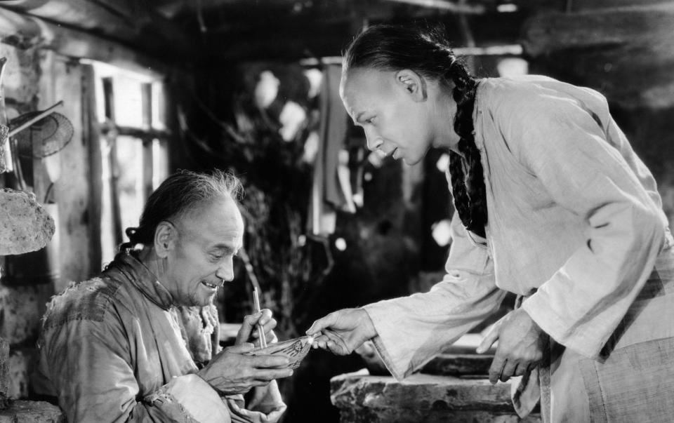'I'm about as Chinese as Herbert Hoover': Paul Muni, left, in The Good Earth - Hulton Archive/Getty Images