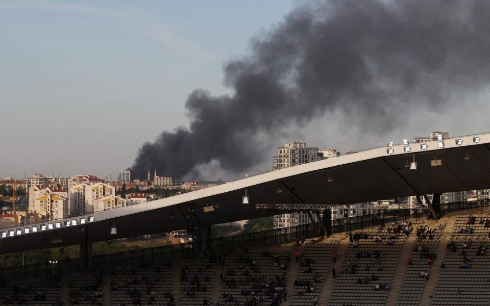It looks as though the fire is some two miles, or so, from the stadium - Reuters/Umit Bektas