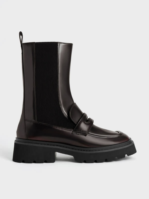 <p>Charles & Keith Penny Loafer Chelsea Boots, $96, <a href="https://www.charleskeith.com/us/shoes/CK1-90920107_BURGUN.html?" rel="nofollow noopener" target="_blank" data-ylk="slk:available here;elm:context_link;itc:0;sec:content-canvas" class="link ">available here</a></p>