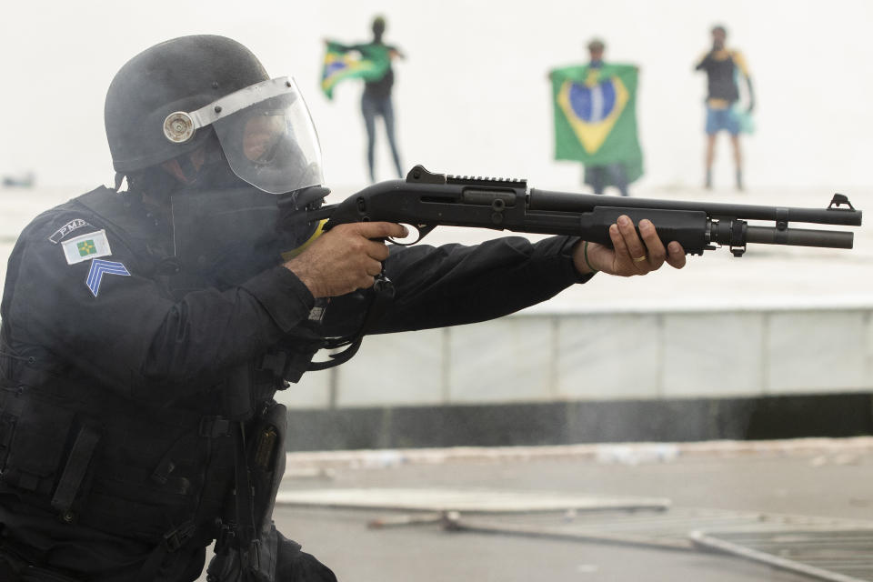 Supporters of former President Jair Bolsonaro clash with security forces as they raid the National Congress in Brasilia, Brazil, January 8, 2023. (Joedson Alves/Anadolu Agency via Getty Images)