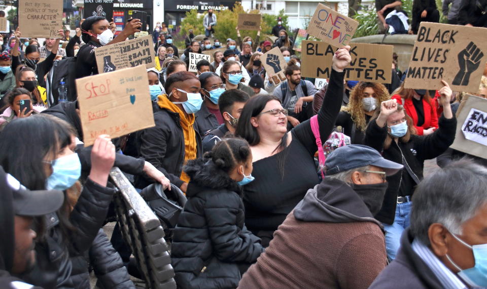  Protesters hold placards during the demonstration. Hundreds of people turned out in Bedford town centre, to hold a peaceful demonstration as part of a worldwide Black Lives Matter solidarity Protest triggered by the death of George Floyd, while in police custody. (Photo by Keith Mayhew / SOPA Images/Sipa USA) 