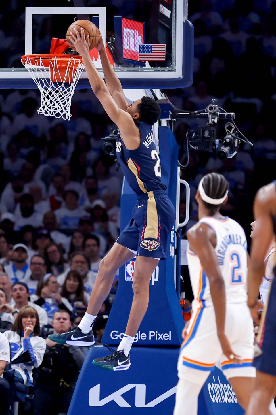 New Orleans guard Trey Murphy III (25) dunks the ball in the third quarter during game one of the NBA playoffs between the Oklahoma City Thunder and the New Orleans Pelicans at the Paycom Center in Oklahoma City, on Sunday, April 21, 2024.