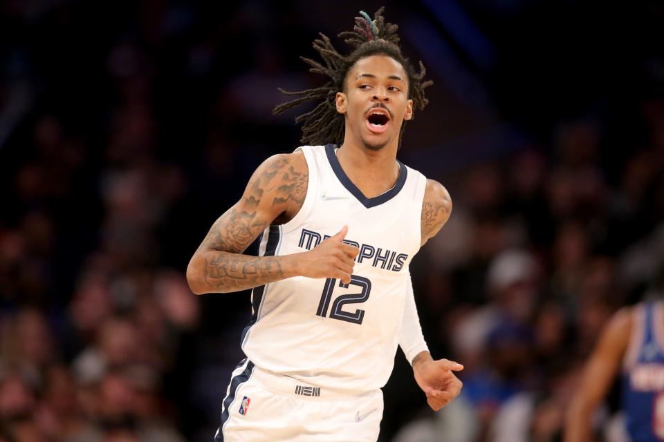 Feb 2, 2022; New York, New York, USA; Memphis Grizzlies guard Ja Morant (12) reacts during the second quarter against the New York Knicks at Madison Square Garden. Mandatory Credit: Brad Penner-USA TODAY Sports