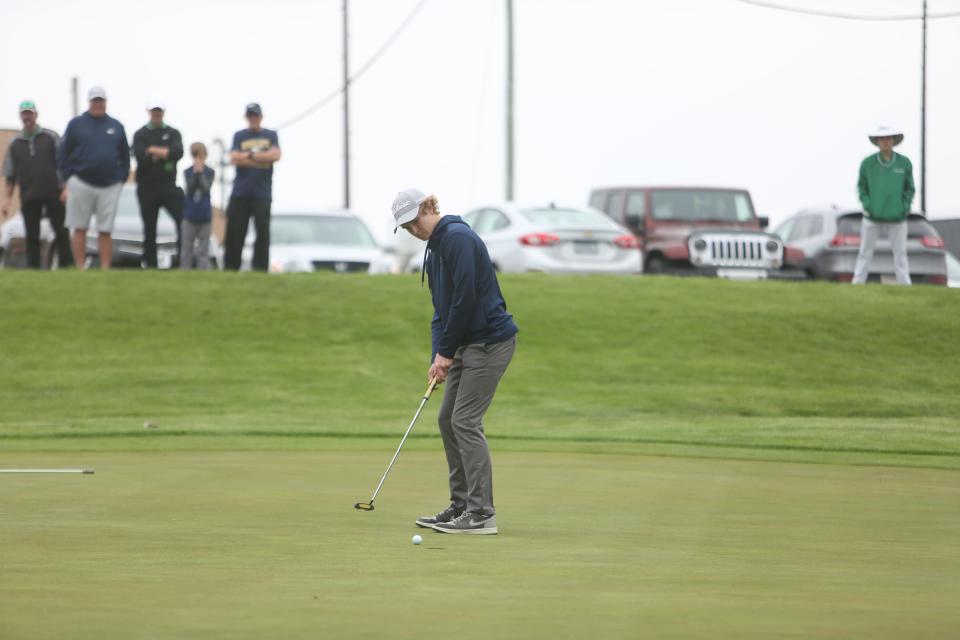 Delta boys golf sophomore Jake Bilby sinks a putt for par to win the 2022 Delaware County tournament match-medalist playoff at Elks Country Club on Saturday, April 30, 2022.