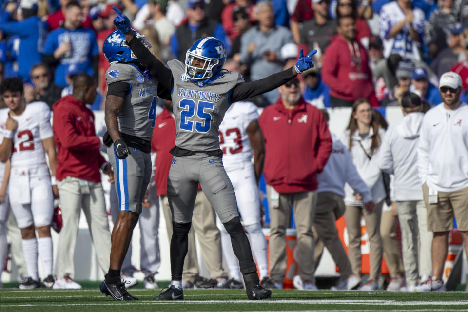 Kentucky defensive back Jordan Lovett (25) celebrates an interception during the first half of an NCAA college football game against Alabama in Lexington, Ky., Saturday, Nov. 11, 2023. (AP Photo/Michelle Haas Hutchins)