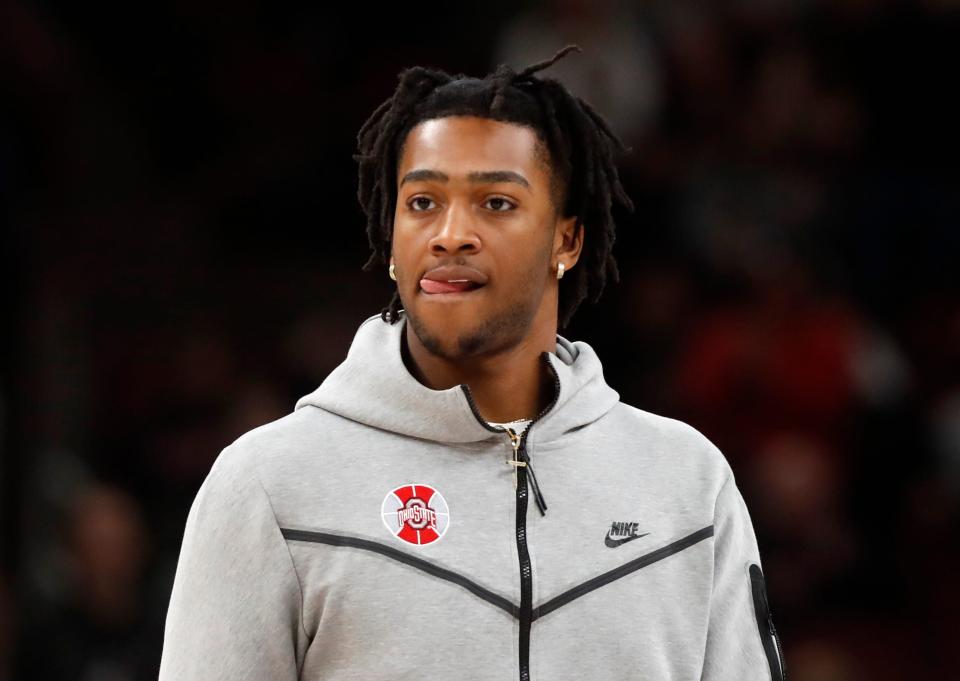 Ohio State Buckeyes forward Brice Sensabaugh (10) watches his teammates warmup before the Big Ten Menâ€™s Basketball Tournament semifinal game against the Purdue Boilermakers, Saturday, March 11, 2023, at United Center in Chicago. Purdue won 80-66.

Purosu031123 Am18250