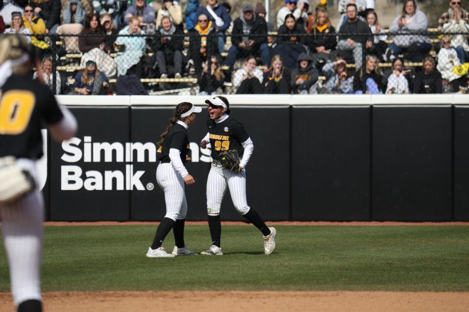 Missouri softball right fielder Kayley Lenger celebrates in the outfield during MU's 3-2 win over LSU on Saturday at Mizzou Softball Stadium.