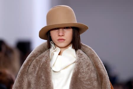 A model presents a creation by designer Samuel Drira as part of his Fall/Winter 2016/2017 women's ready-to-wear collection show for Nehera in Paris, France, March 1, 2016. REUTERS/Benoit Tessier