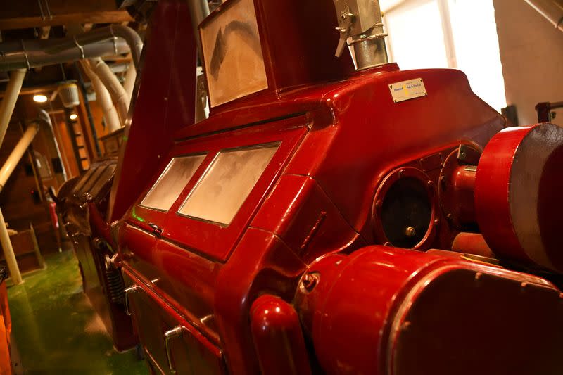 A flour milling machine is seen inside the family run Shipton Mill in Tetbury