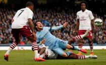 Manchester City v Aston Villa - Barclays Premier League - Etihad Stadium - 25/4/15 Manchester City's David Silva in action with Aston Villa's Jores Okore Reuters / Phil Noble