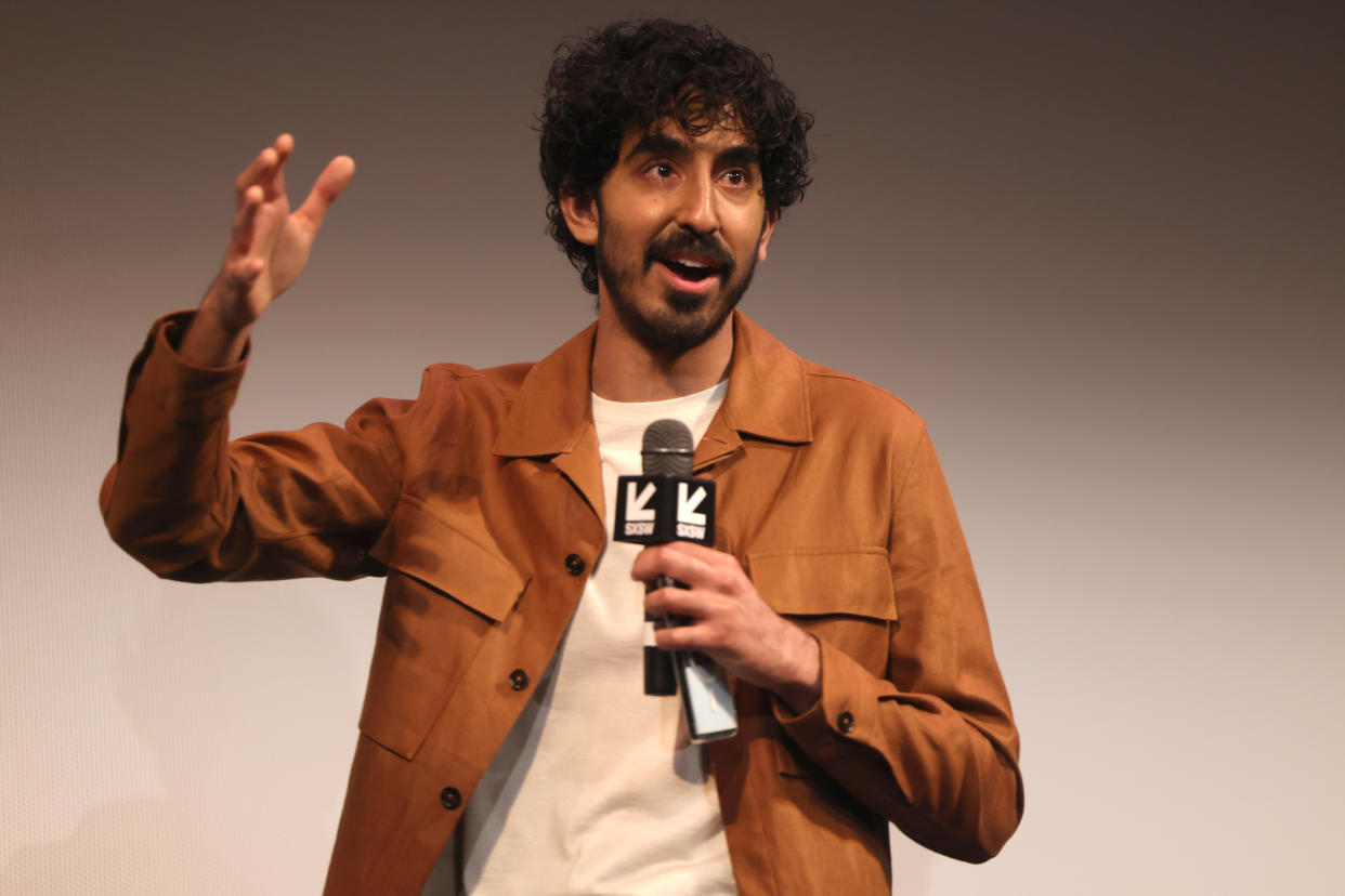 AUSTIN, TEXAS - MARCH 11: Dev Patel speaks on stage as Universal Pictures presents the SXSW premiere of 