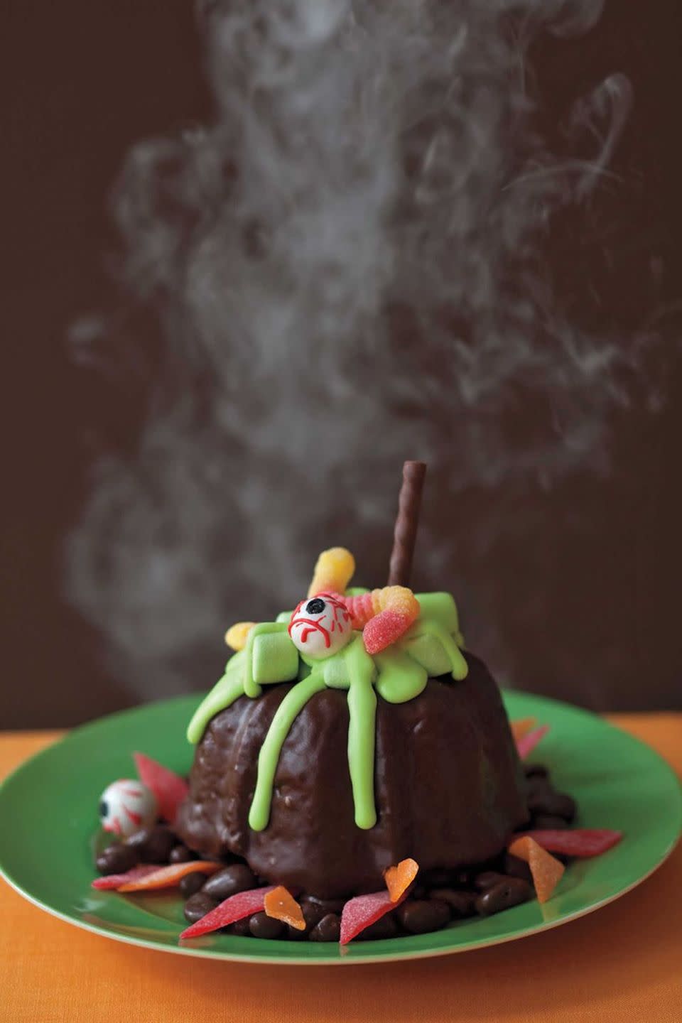 <p>This fun take on a classic chocolate lava cake is sure to wow. Oozing with green frosting instead of a chocolate ganache, these desserts are guaranteed to scare, wow, and satisfy.</p><p><em><a href="https://www.womansday.com/food-recipes/food-drinks/recipes/a11039/mini-cauldrons-recipe-122469/" rel="nofollow noopener" target="_blank" data-ylk="slk:Get the recipe for Mini Cauldrons.;elm:context_link;itc:0;sec:content-canvas" class="link ">Get the recipe for Mini Cauldrons. </a></em></p>