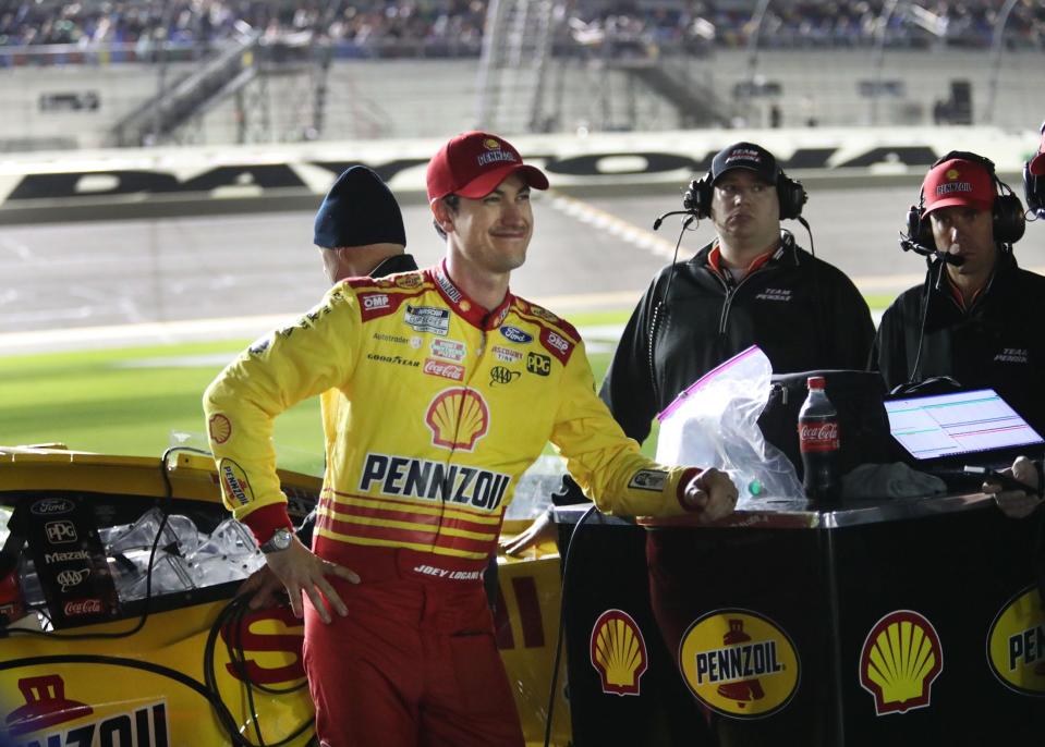 Joey Logano watches the scoreboard during Wednesday's qualifying.