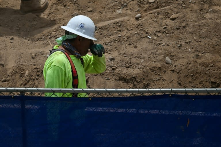 The US government on Tuesday proposed new regulations to protect laborers working in extremely high temperatures, as heat waves intensified by climate change (Patrick T. Fallon)