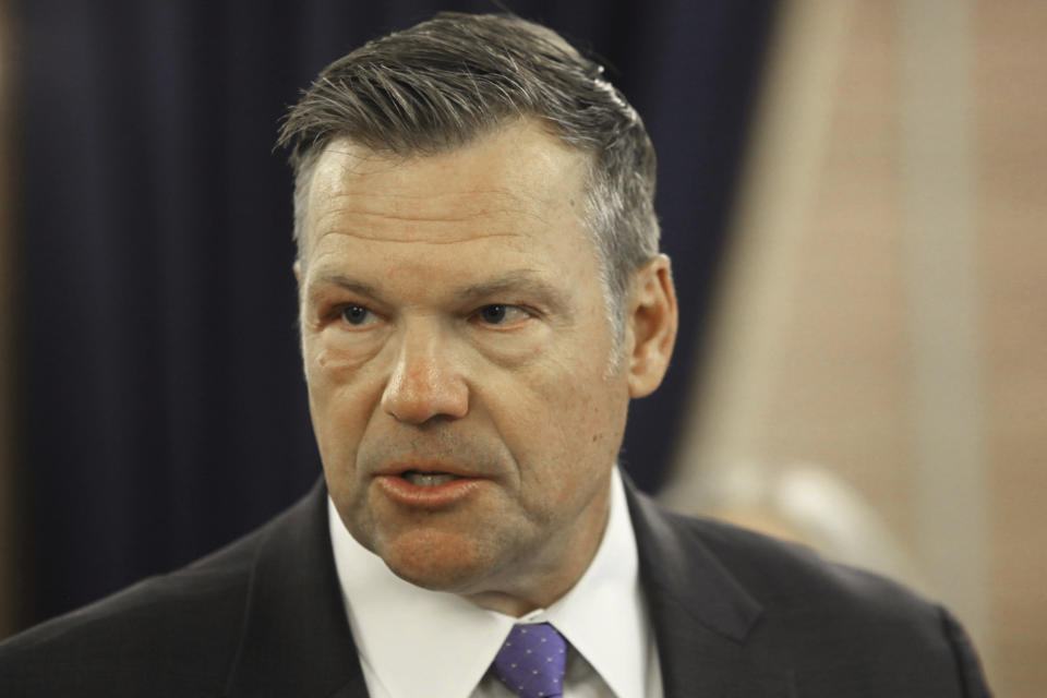 Kansas Attorney General Kris Kobach answers questions during a news conference about a new state law that defines male and female in state law so that transgender people can't change their driver's licenses and birth certificates to reflect their gender identities, Monday, June 26, 2023, at the Statehouse in Topeka, Kansas. The number of people making those changes jumped more than 300% this year ahead of the new law taking effect. (AP Photo/John Hanna)