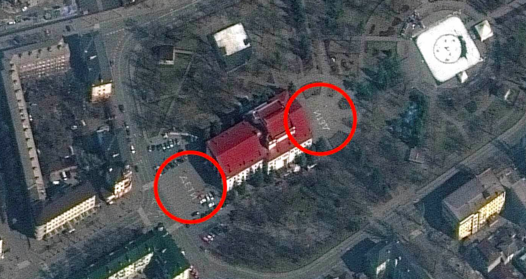 Satellite imagery of the Mariupol Drama Theatre (centre) shows the word 'children' is written in large white letters (in Russian) in front of and behind the theatre. (Satellite image (c) 2022 Maxar Technologies/Getty)