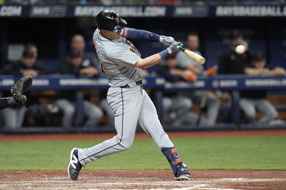 Detroit Tigers' Mark Canha lines an RBI single off Tampa Bay Rays starting pitcher Zack Littell during the fifth inning of a baseball game Monday, April 22, 2024, in St. Petersburg, Fla. Detroit's Jake Rogers scored on the hit. (AP Photo/Chris O'Meara)