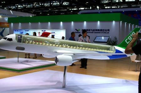 File Photo - A model of C919 passenger jet by Commercial Aircraft Corp of China Ltd (COMAC) is displayed at Aviation Expo China 2017 in Beijing, China September 19, 2017. REUTERS/Stringer