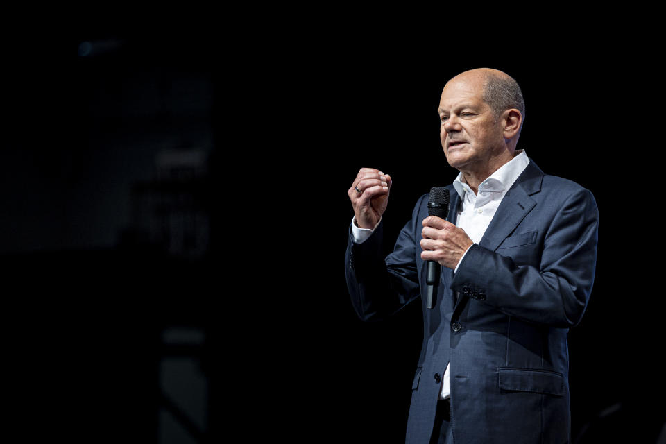 German Chancellor Olaf Scholz delivers a speech at a state representative meeting of the Lower Saxony SPD in Hildesheim, Germany, Saturday, May 21, 2022. (Moritz Frankenberg/dpa via AP)